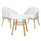 Patio furniture set with glass table and two white wicker chairs