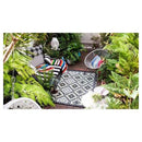 Lhasa Black And Cream Outdoor Rug