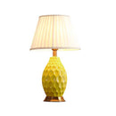 Soga Textured Ceramic Oval Table Lamp With Gold Metal Base Yellow